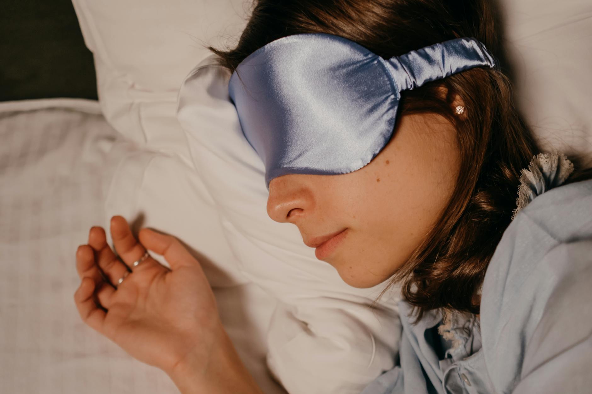 asleep woman wearing eye mask